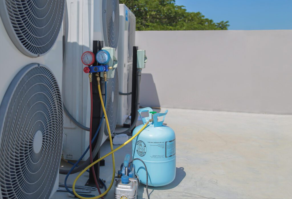 air conditioning being charged with refrigerant